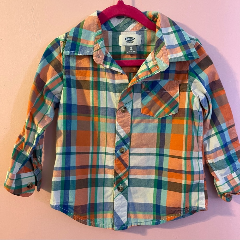 Plaid button down shirt . Perfect for layering .